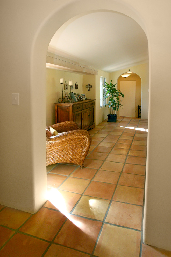 This is an example of a mediterranean hallway in San Francisco with terra-cotta floors.