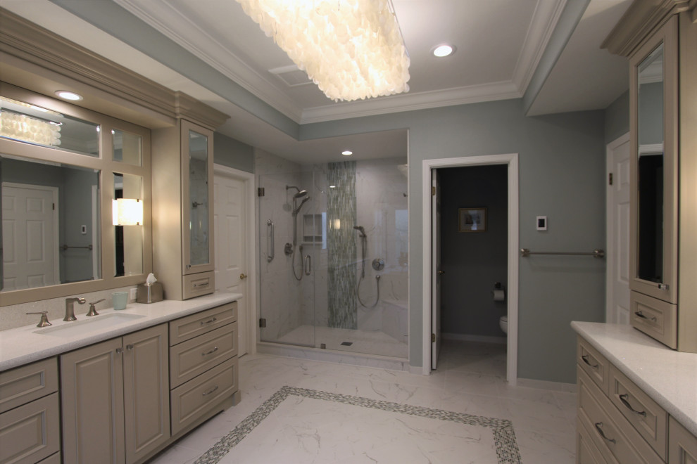 Design ideas for a large transitional master bathroom in San Francisco with raised-panel cabinets, beige cabinets, an alcove tub, an alcove shower, a one-piece toilet, white tile, porcelain tile, green walls, porcelain floors, an undermount sink, engineered quartz benchtops, white floor, a hinged shower door, white benchtops, an enclosed toilet, a single vanity, a built-in vanity and recessed.