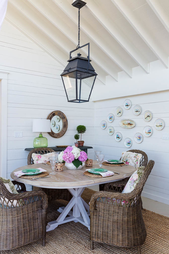 Inspiration for a small coastal light wood floor kitchen/dining room combo remodel in Boston with white walls and no fireplace