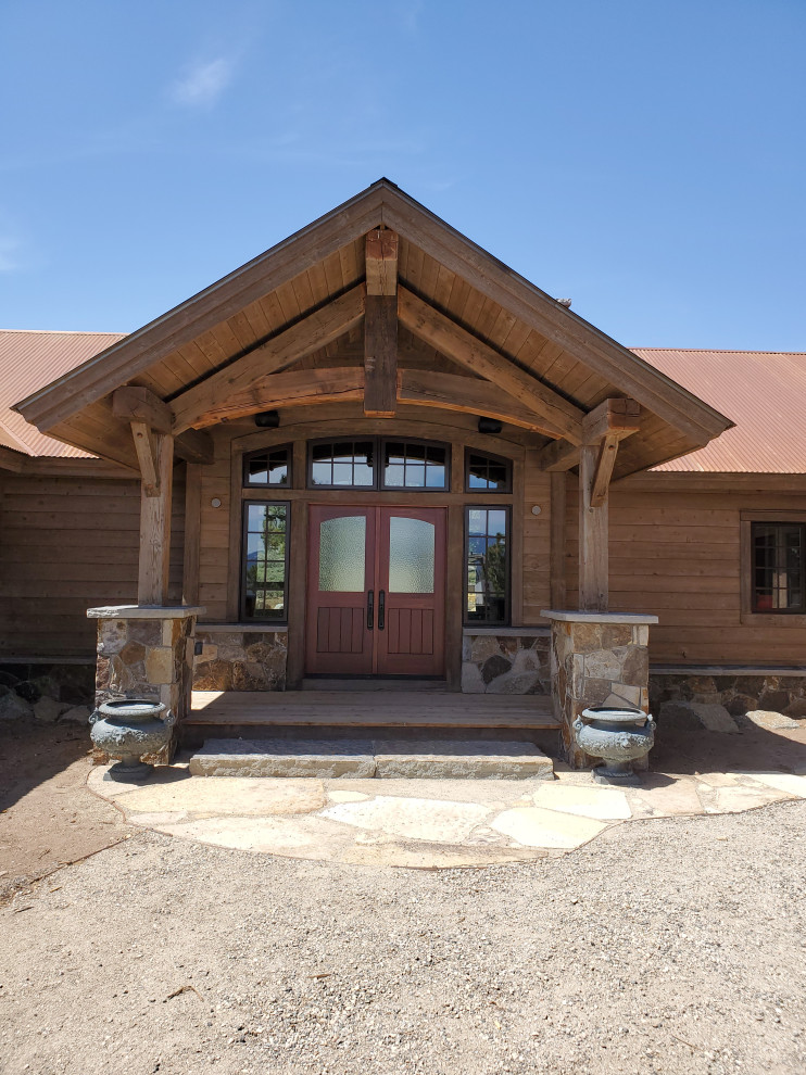 Inspiration for a rustic entryway remodel in Denver