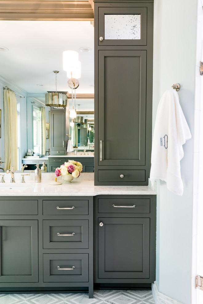 Inspiration for a large transitional master freestanding bathtub remodel with shaker cabinets, gray cabinets, white walls, an undermount sink, quartz countertops and white countertops