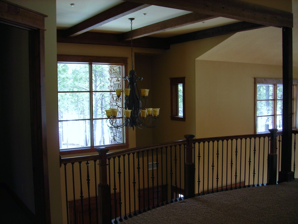 This is an example of a large country foyer in Las Vegas with slate floors and a single front door.