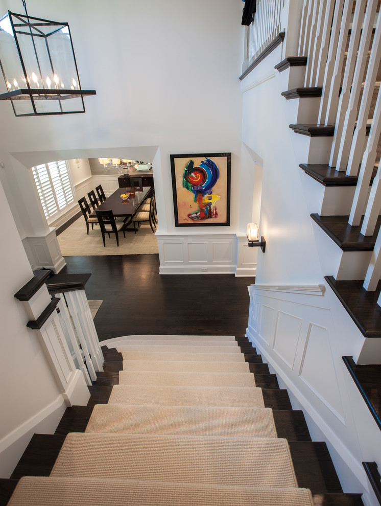 Inspiration for a large transitional carpeted u-shaped staircase in Dallas with carpet risers.