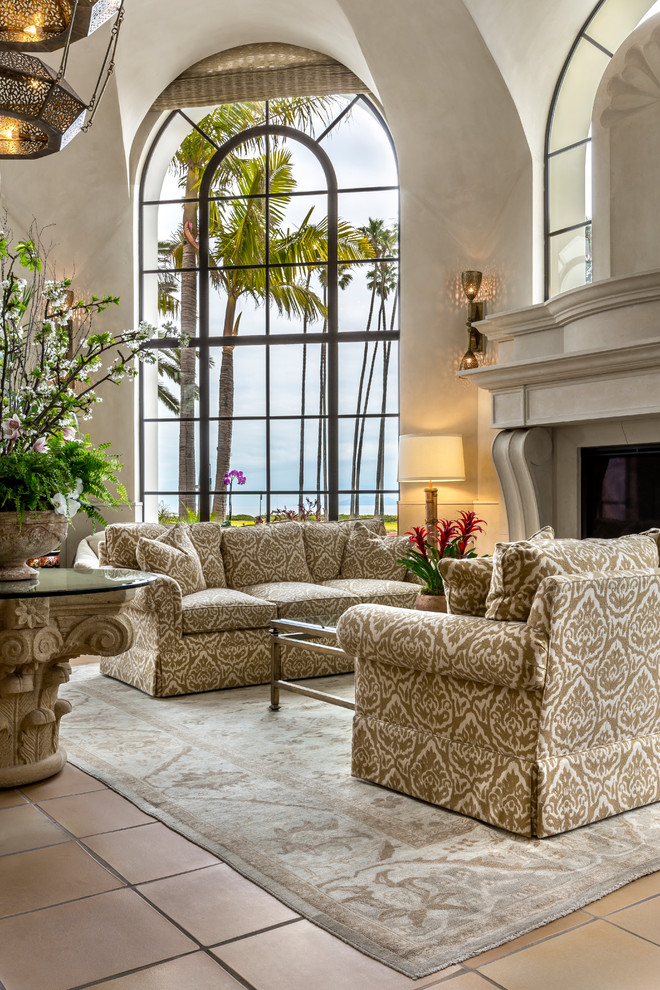 Inspiration for a mid-sized mediterranean foyer in Santa Barbara with grey walls, ceramic floors, a double front door, a white front door and yellow floor.