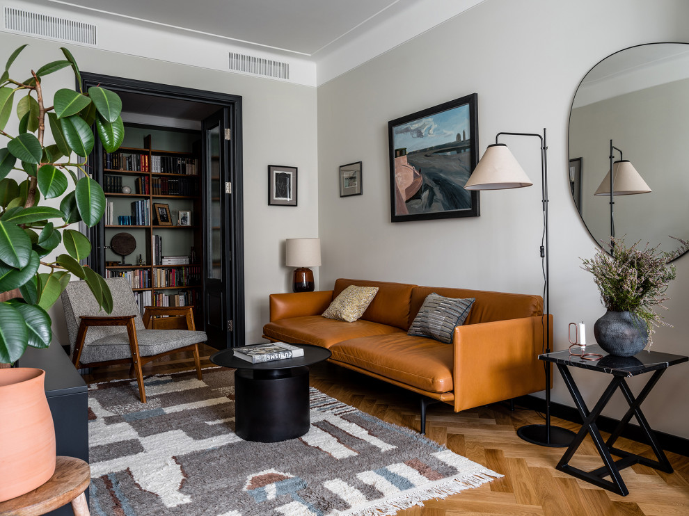 Modelo de salón contemporáneo con suelo de madera clara