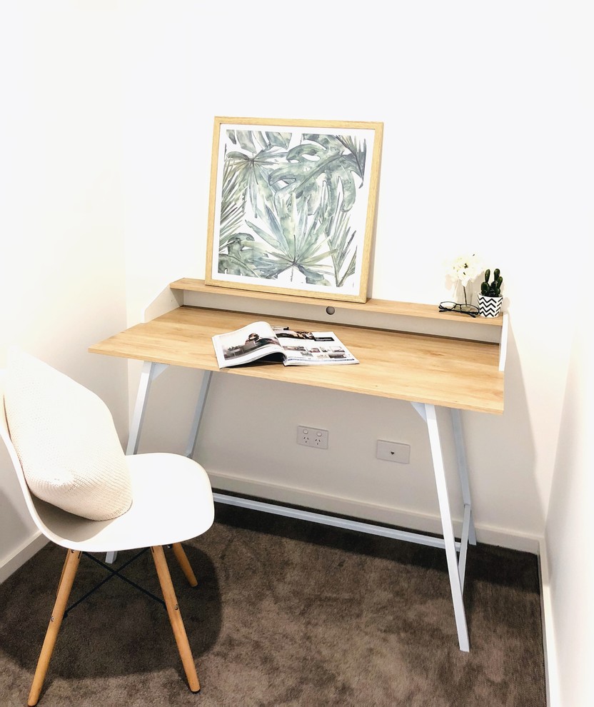 Small scandinavian study room in Canberra - Queanbeyan with white walls, carpet, a freestanding desk and grey floor.