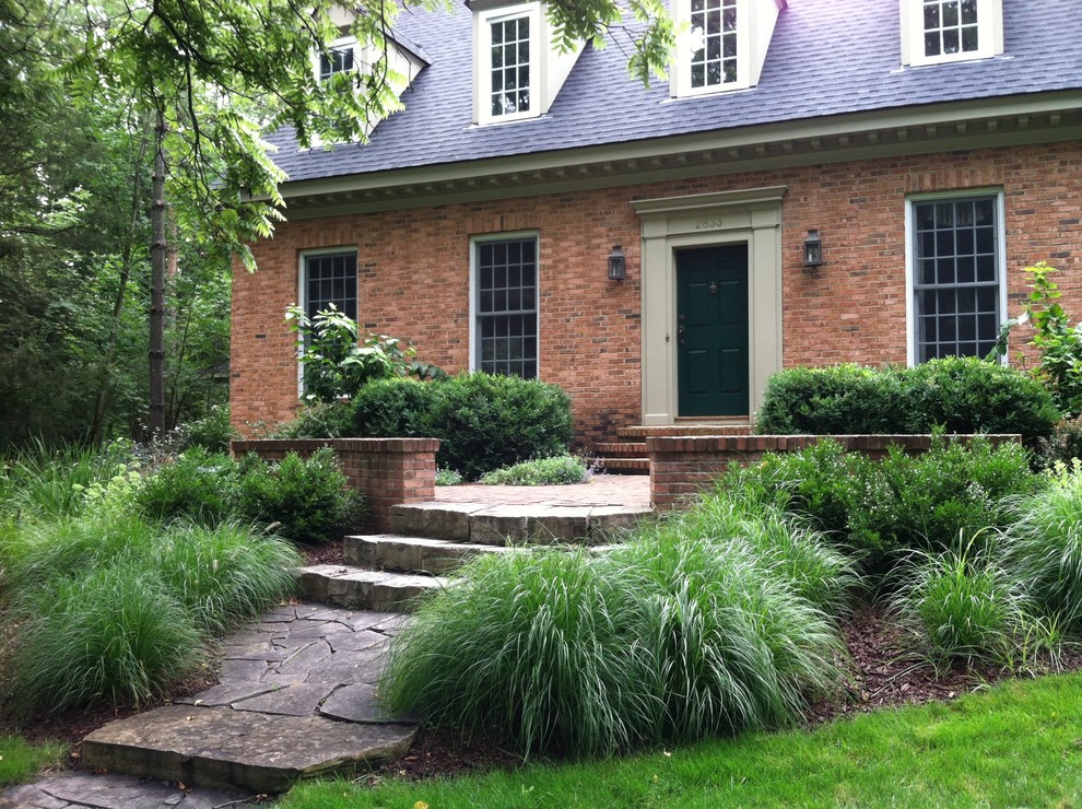 Raised Patio with Natural Stone at Front Entrance - Traditional