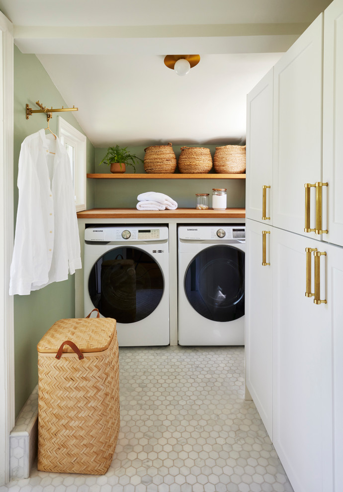 Photo of a transitional laundry room.