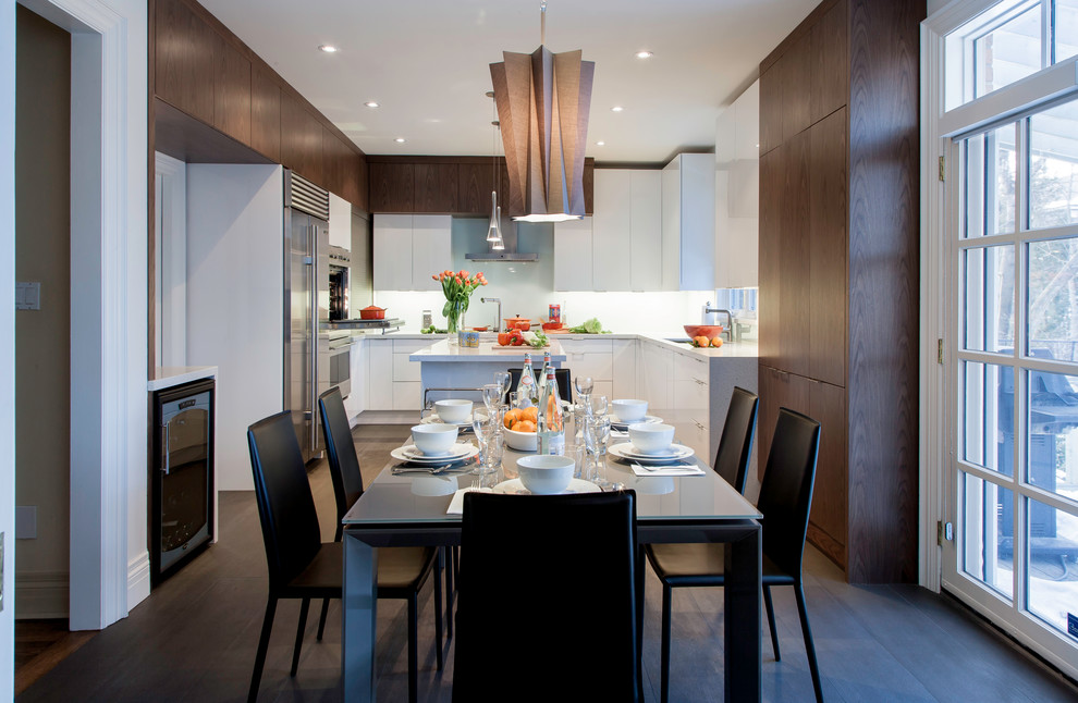 This is an example of a contemporary open plan dining in Toronto.