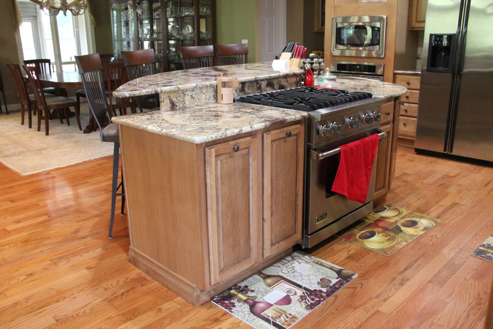 This is an example of a traditional kitchen in Chicago with a drop-in sink and ceramic floors.