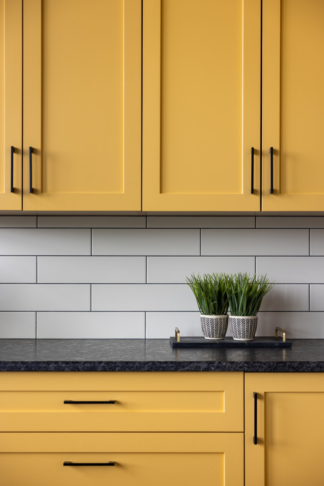 Example of a mountain style kitchen design in Vancouver
