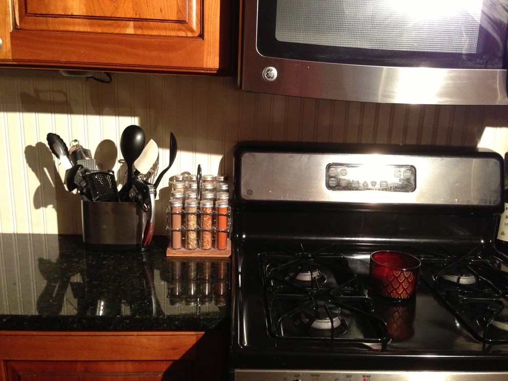 Can you put a tile backsplash over wainscoting?