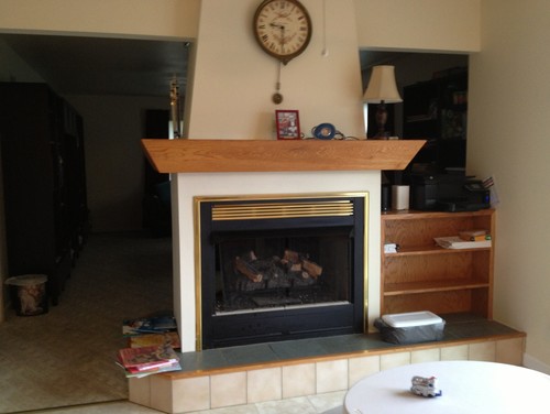 Ugly brass front on gas fireplace..... Hi-we have been in our house about a year and we are finally going to get rid of our 5 different floorings and get new laminate. My dilemma is our see through gas fireplace-I don