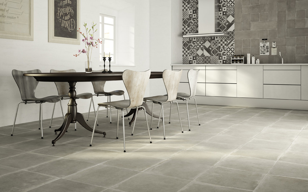 Inspiration for a transitional porcelain tile kitchen remodel in New York with gray walls