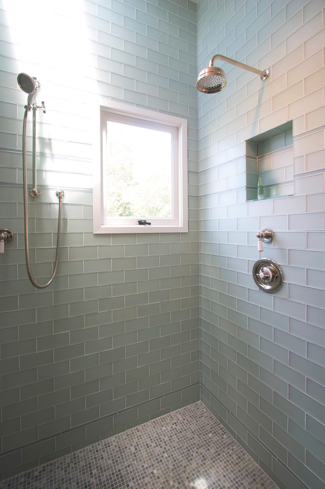 Design ideas for a mid-sized contemporary master bathroom in San Francisco with glass-front cabinets, white cabinets, a corner shower, a two-piece toilet, subway tile, blue walls and dark hardwood floors.