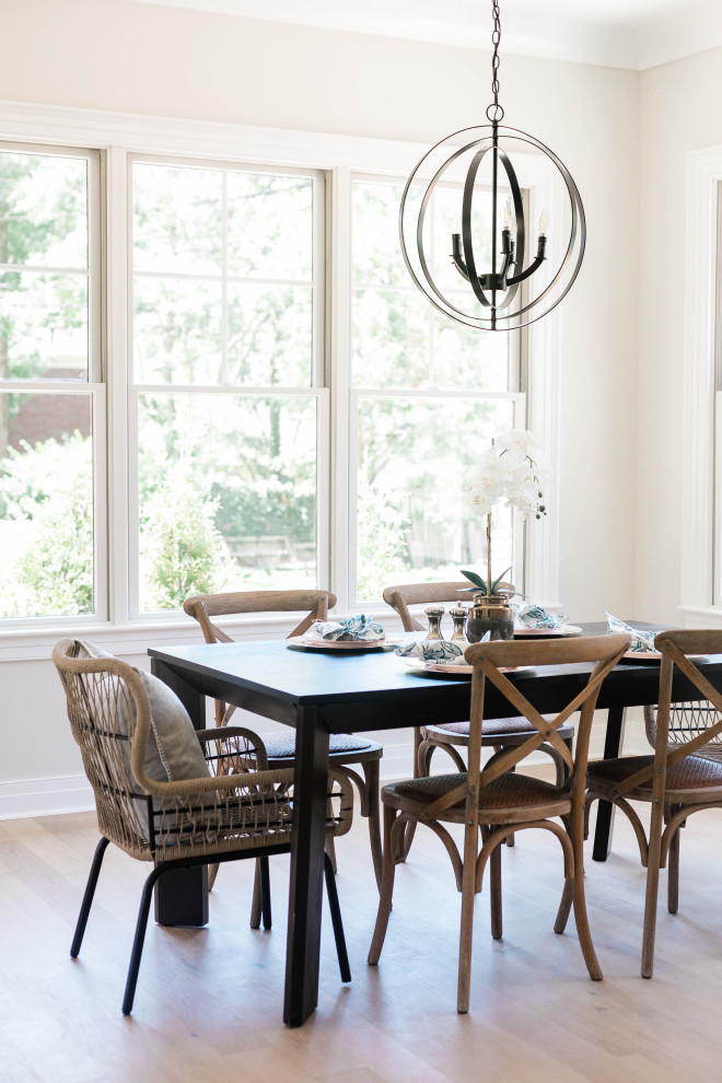 This is an example of a mid-sized transitional dining room in Other.