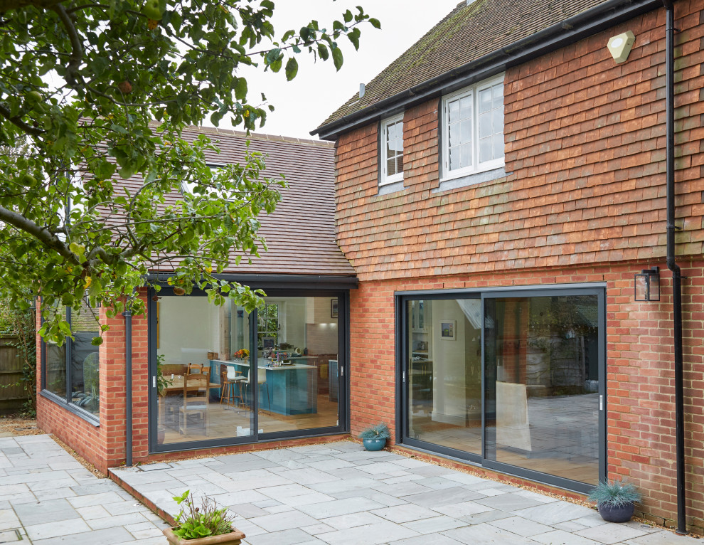 Photo of a traditional one-storey brick house exterior in Berkshire.