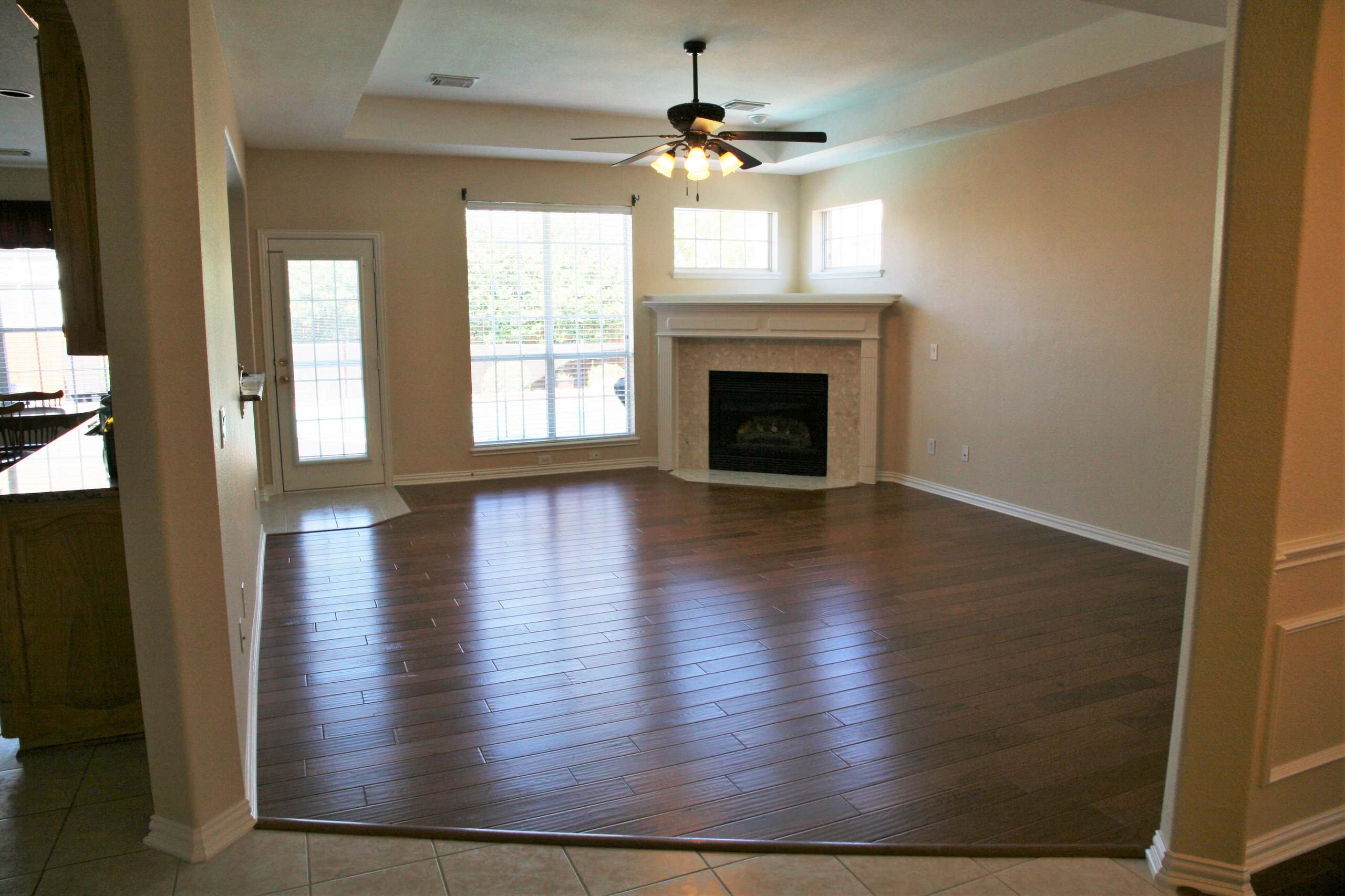Formal Living Area conversion to Home Office with wood flooring