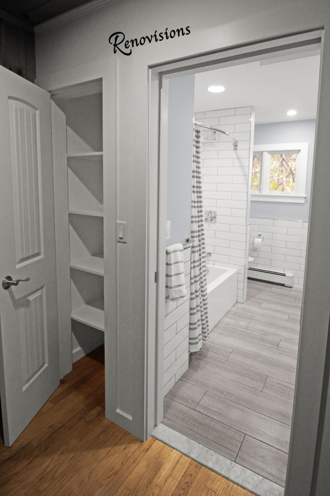 Photo of a mid-sized contemporary kids bathroom in Boston with flat-panel cabinets, medium wood cabinets, an alcove tub, a shower/bathtub combo, a two-piece toilet, white tile, ceramic tile, blue walls, porcelain floors, an undermount sink, engineered quartz benchtops, grey floor, a shower curtain and white benchtops.
