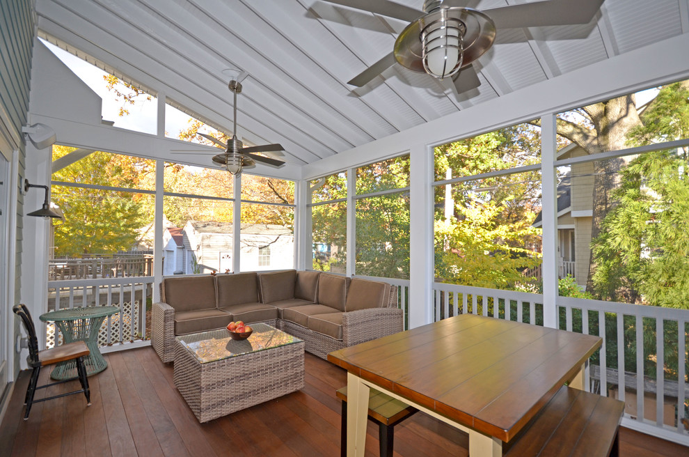 Traditional screened-in verandah in DC Metro with decking and a roof extension.