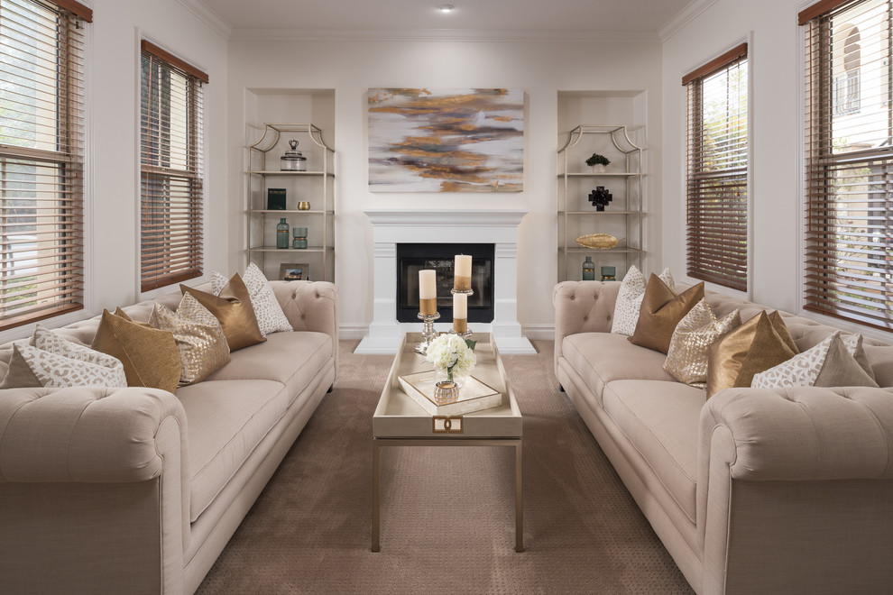 Transitional formal living room in San Diego with beige walls, carpet, a standard fireplace, no tv and beige floor.