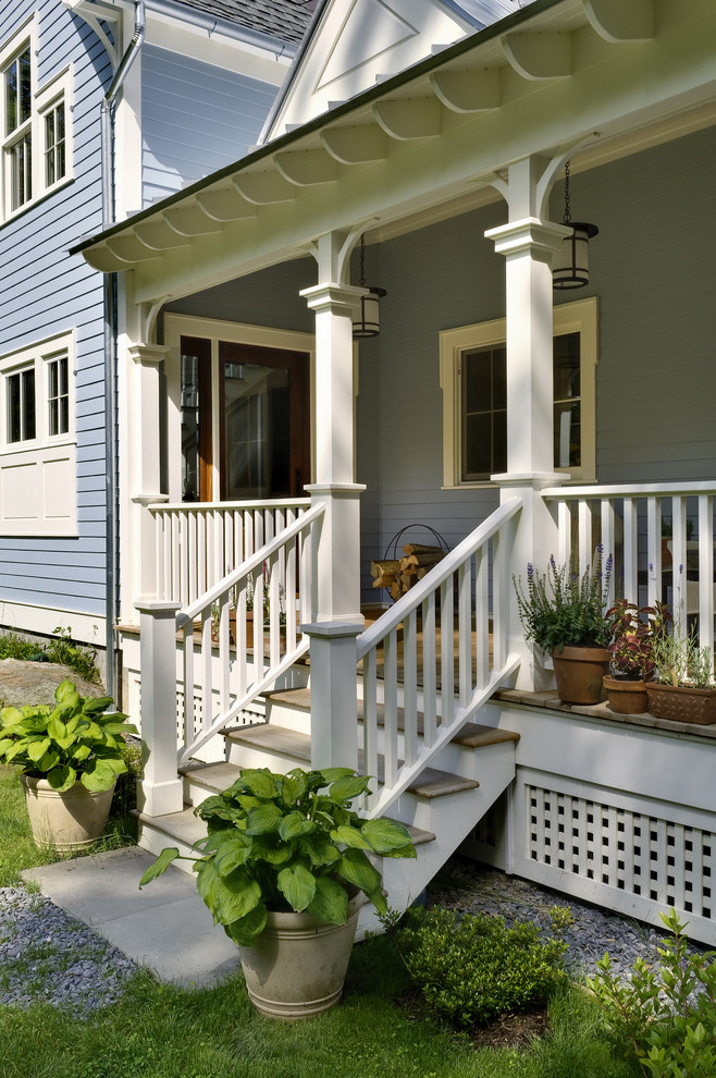 Design ideas for a traditional verandah in New York with decking and a roof extension.