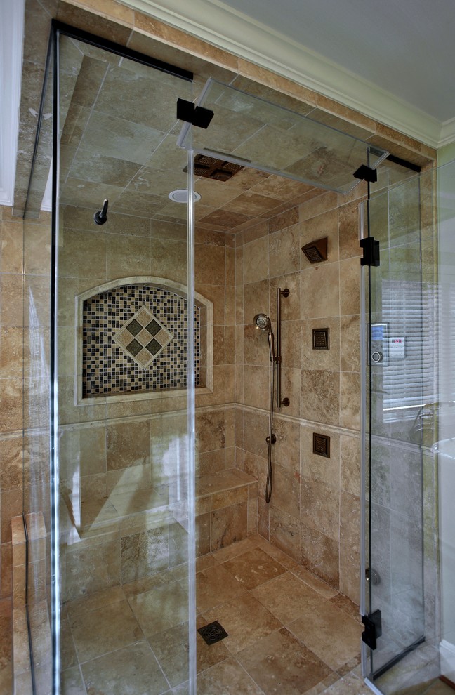 Large mediterranean master bathroom in DC Metro with a corner shower, beige tile, stone tile, beige walls and marble floors.