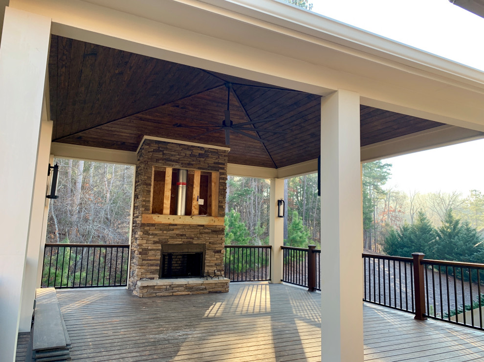 Inspiration for a large classic back first floor mixed railing terrace in Atlanta with a fireplace and a pergola.