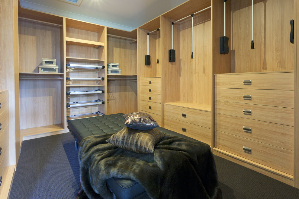 Photo of a contemporary storage and wardrobe in London.