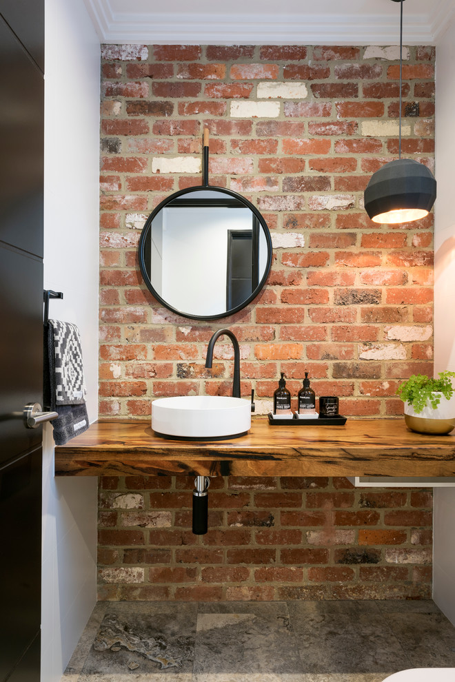 This is an example of a contemporary powder room in Perth with white walls, a vessel sink, wood benchtops and brown benchtops.