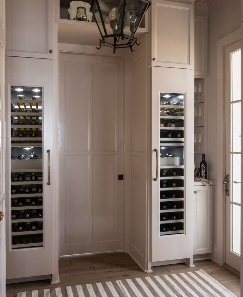 This is an example of a beach style wine cellar in Atlanta.