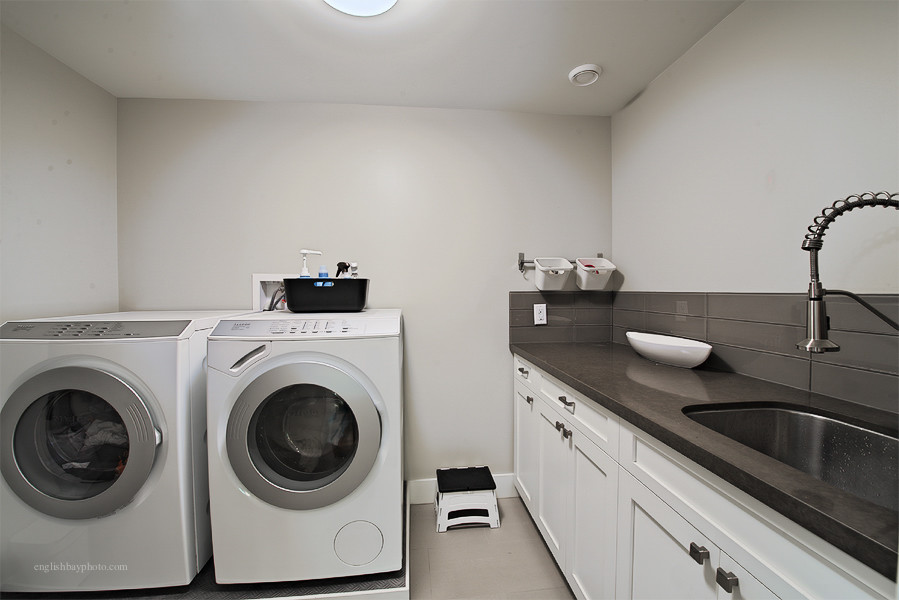 Photo of a scandinavian laundry room in Vancouver.