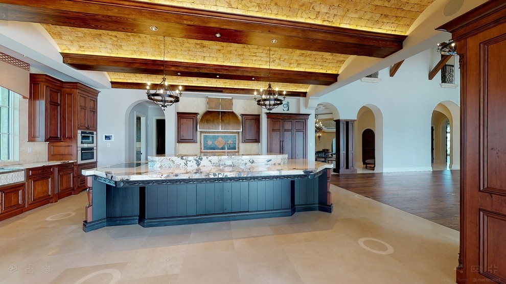 Inspiration for a huge rustic travertine floor and beige floor enclosed kitchen remodel in Miami with an undermount sink, beaded inset cabinets, dark wood cabinets, granite countertops, multicolored backsplash, ceramic backsplash, paneled appliances, an island and multicolored countertops