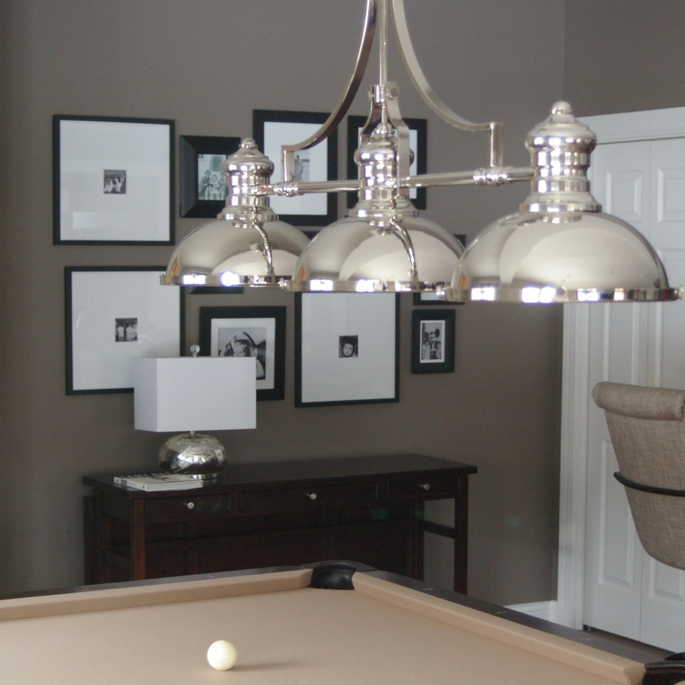 Inspiration for a mid-sized transitional enclosed family room in Other with grey walls, a game room and no fireplace.