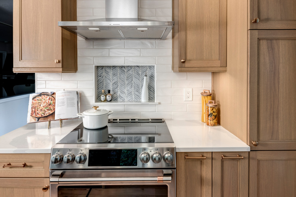 Example of a transitional kitchen design in Seattle