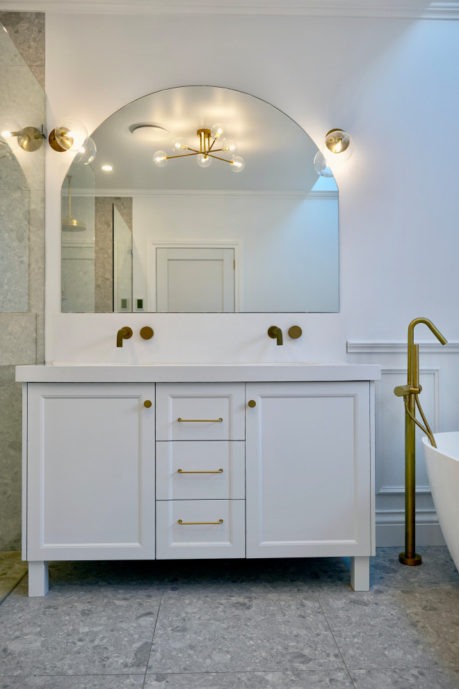 Design ideas for a small transitional 3/4 bathroom in Sydney with recessed-panel cabinets, white cabinets, white tile, engineered quartz benchtops and white benchtops.