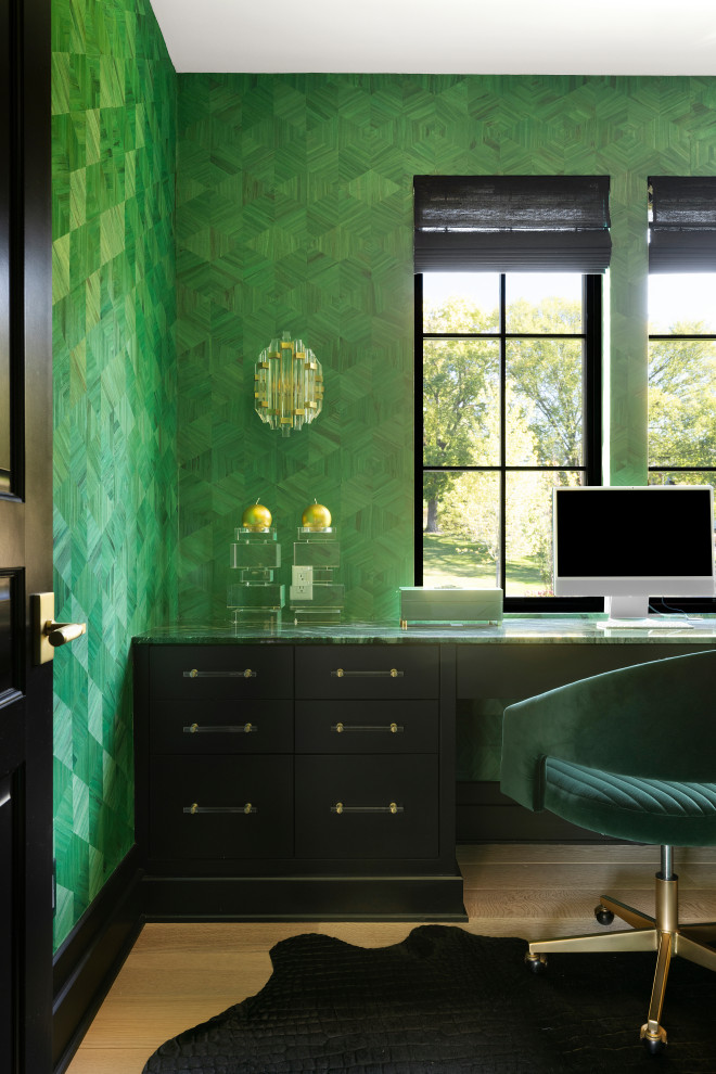 Example of a transitional home office design in Minneapolis
