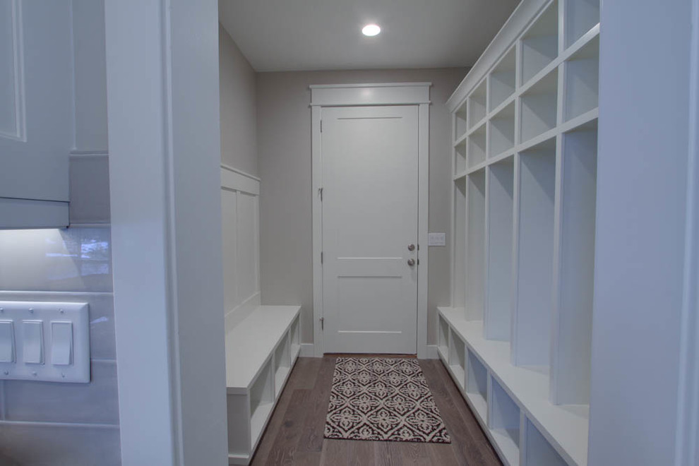 Small transitional mudroom in Salt Lake City with beige walls.