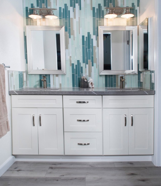 Inspiration for a beach style bathroom in Phoenix with shaker cabinets.