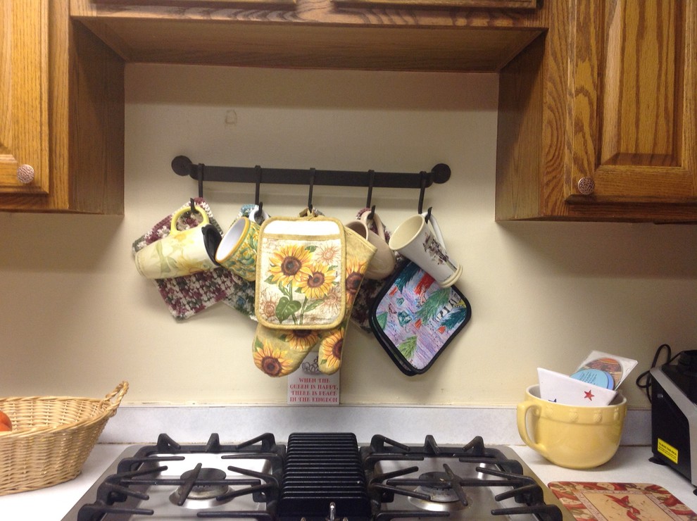 How far does a microwave need to be above a gas cooktop stove?