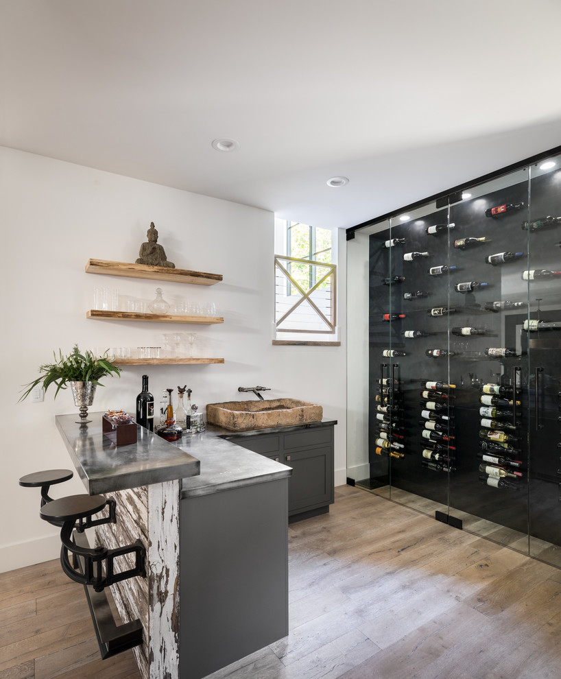 Inspiration for a country wine cellar remodel in Denver