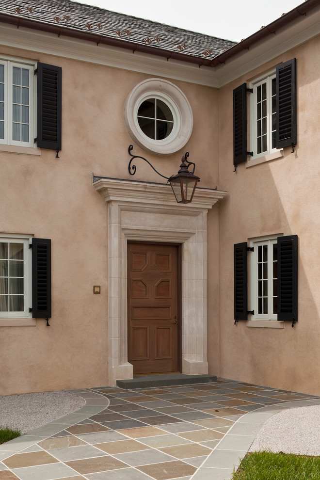 Inspiration for a traditional stucco exterior in Baltimore.