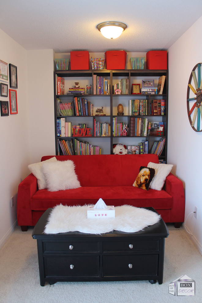 This is an example of a small modern kids' room in Ottawa with red walls and carpet.