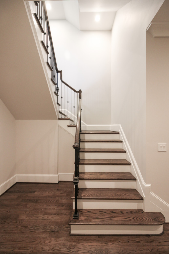 Staircase - large traditional wooden floating metal railing staircase idea in DC Metro with painted risers