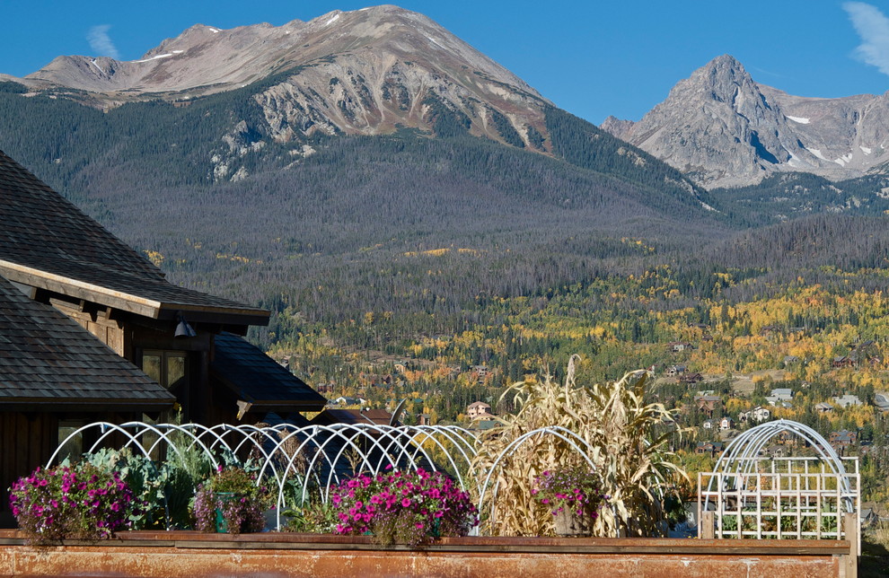 Mountain style three-story wood exterior home photo