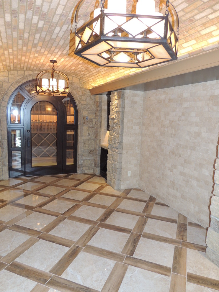 This is an example of an expansive arts and crafts wine cellar in Other with marble floors, storage racks and multi-coloured floor.