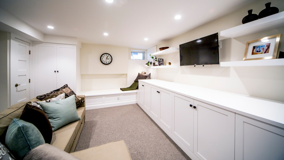 Inspiration for a small transitional look-out carpeted and gray floor basement remodel in Ottawa with beige walls
