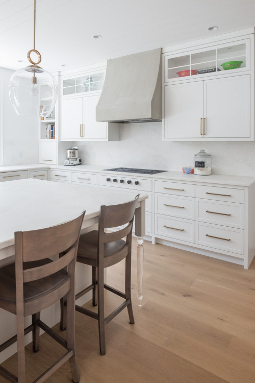 Quartz Sophistication: Modern Kitchen Ideas with White Slab Backsplash and Gray Range Hood