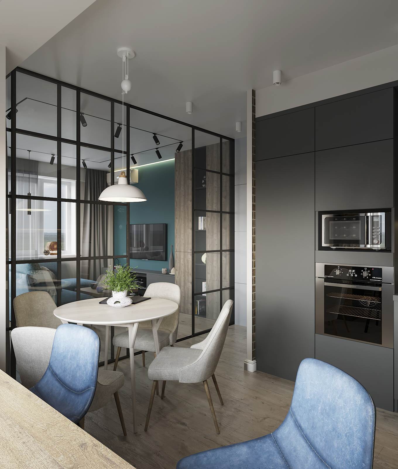 Вид на гостиную и столовую зону.