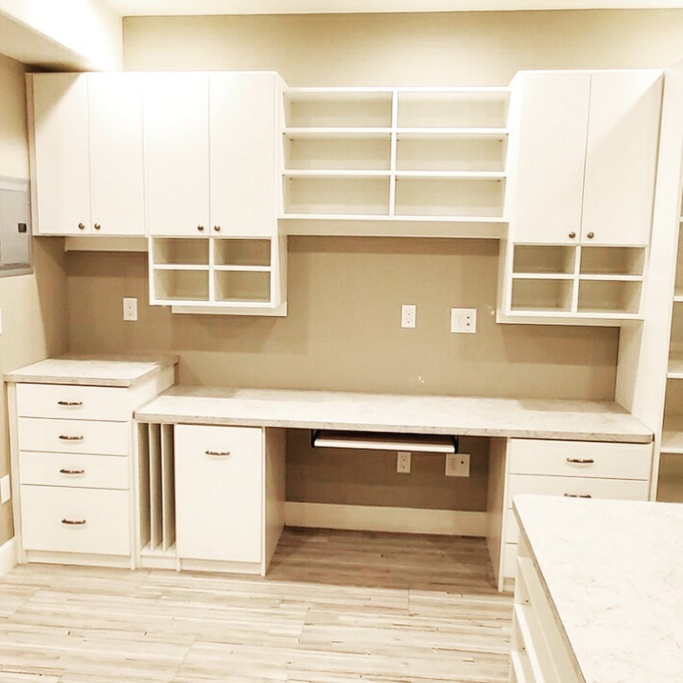 Large Craft Room - This large basement space was dreamed up by the homeowner to allow her to do many crafts with her grandkids! This was a really fun project to do - every craft has it's own placement in the room.